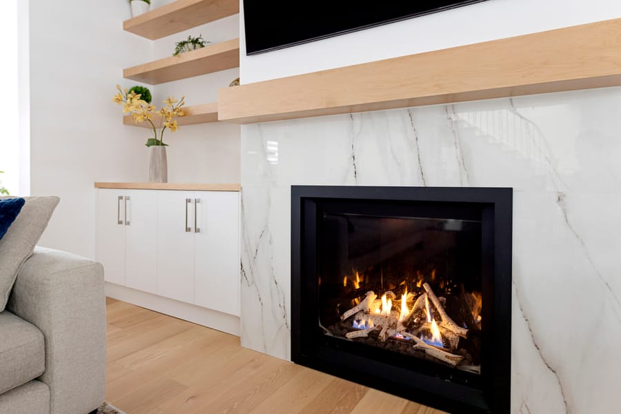A marble heart with a fireplace in a modern living room.