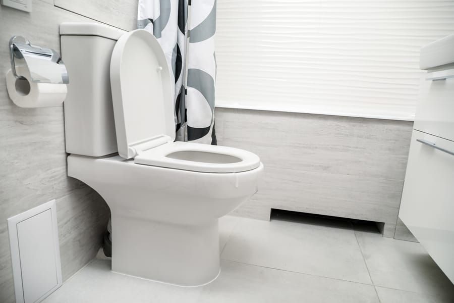a newly installed toilet in a bathroom